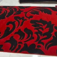 دوعدد کمد و یک عدد فرش و دم فرشی قرمز مشکی