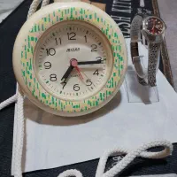 ساعت مچی و رومیزی