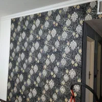 رنگ‌آمیزی و نصب کاغذ دیواری باکیفیت