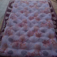 تشک ولحاف دوزی  (به یک لحاف دوز چناران خانم یا اقا
