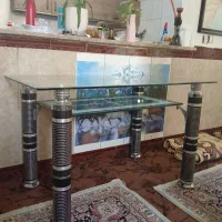 میز ناهار خوری شیشه ای با پایه های استیل ابکاری