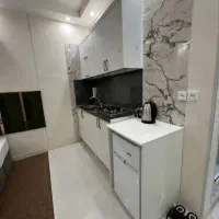 مشهد بااتوبوس و قطار