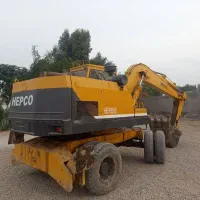 بیل میکانیکی چرخ لاستیکی اچ ای 100