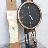 ساعت دیواری پاندول دار قدیمی