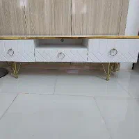 میز تلویزیون و جاسیب زمینی وپیازی