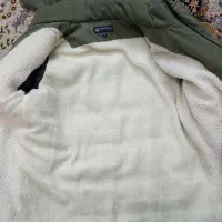 کاپشن|لباس|قم, دروازه کاشان|دیوار