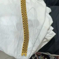یک عدد دستبند رنگ ثابت و یک عدد ساعت