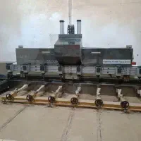 دستگاه سی ان سی cnc ده کله روتاری تخت