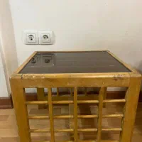 میز عسلی شیشه ای پایه چوبی
