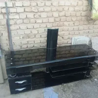 میز تلویزیون شیشه‌ای
