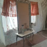 فروش آیینه و شمعدان