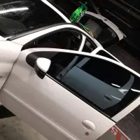 شیشه دودی نانونصب درب منزل کل تهران