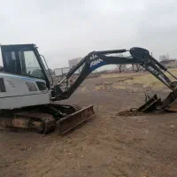 مینی بیل زنجیری باپیکور