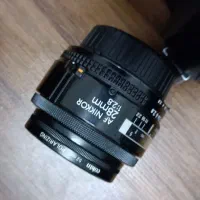 دوربین Nikon D3000 + لنز AF Nikkor 28mm f/2.8|دوربین عکاسی و فیلمبرداری|رشت, سعدی (تختی)|دیوار