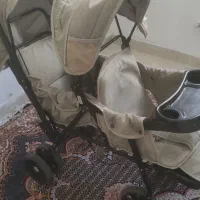 کالسکه دو قلو در حد نو