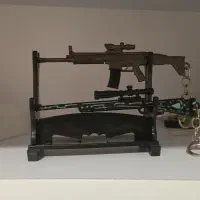 تفنگ اسباب بازی اورجینال همراه با استند