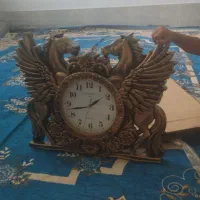 پشتی روفرشی و ساعت