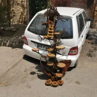 استند گل درختی