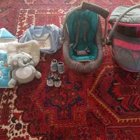 کریر و ساک و کیسه خواب و محافظ سر کودک