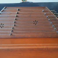 سنتور دومهر موسوی|سازهای سنتی|کرمان, |دیوار