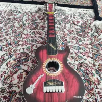 تاب بچه گانه و گیتار