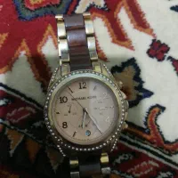 ساعت مایکل کورس  و ساعت امگا see master