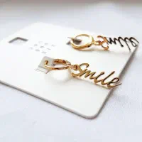 گوشواره حلقه ای آویزدار سمایل با روکش طلا|بدلیجات|کرمان, |دیوار