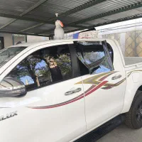 نصب انواع برچسب دودی شیشه وکاور بدنه اتومبیل