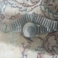 کتاب قران قدیمی وساعت قدیمی|کلکسیون اشیاء عتیقه|الیگودرز, |دیوار