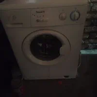 لباس شویی ابسال