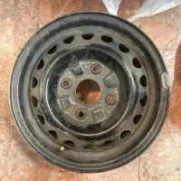 4 چهار عدد رینگ پرایدی خیلی قدیمی  و چراغ پراید