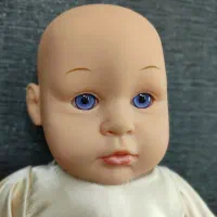 عروسک چشم تیله ای