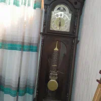 ساعت ایستاده ومیز تلفن