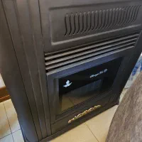 بخاری گازی شارق طوس دوازده هزار|بخاری، هیتر، شومینه|اصفهان, باغ زرشک|دیوار