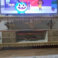میز تلوزیون برنجی  ساعت ایستاده