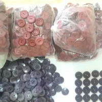 دکمه مانتویی