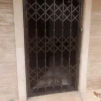 نصب درب حفاظ اکاردئونی ورودی ساختمان|مصالح و تجهیزات ساختمان|رشت, باهنر|دیوار