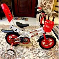 دوچرخه سایز ۱۲کاملا نو و آکبند فقط  ۳۹۰۰  ت