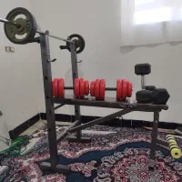 میز بدنسازی و دمبل