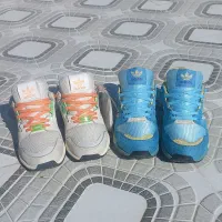 کتونی zxفیروزه ای و زلاندو