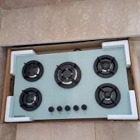 اجاق گاز شیشه ای با رنگ سفید