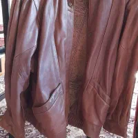 دو عدد کاپشن چرم مردانه به همراه یک کت