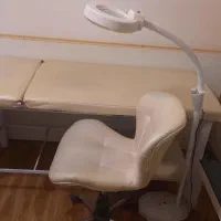 تخت تتو .مژه .صندلی و لوپ