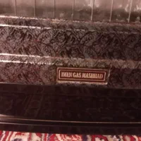 بخاری گازی و زیر تلویزیون