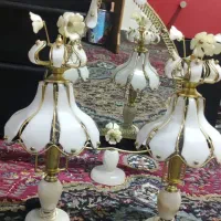 آینه شمعدان شمعدانها روشن میشوند
