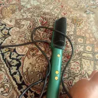 اتو برسی نو نو زیاد استفاده نشده یک تومان