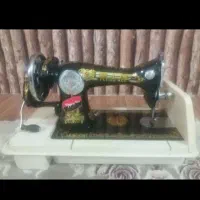 چرخ خیاطی ( مرد پرنده)|چرخ خیاطی و ریسندگی|قوچان, |دیوار