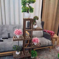 استند گل همراه گل مصنوعی