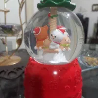 گوی موزیکال چرخشی و پمپی آدم برفی کریسمس