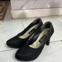 کفش زنانه|کیف، کفش، کمربند|رشت, فلسطین|دیوار